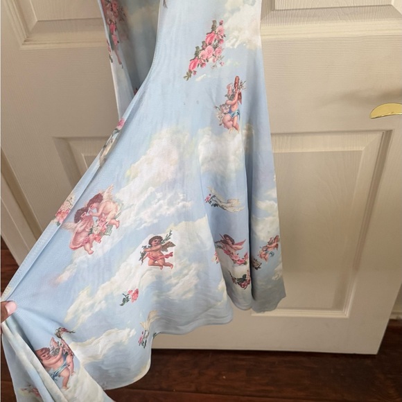 Dolls Kill Blue Cloud & Cherub Print Flared Leggings - Picture 2 of 7